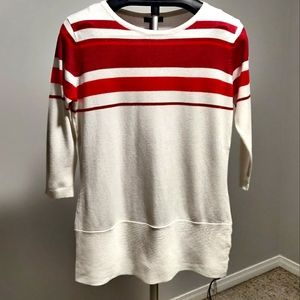 White sweater with red and pink stripes